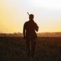 hunter-silhouette-sunset-hunting-2022-11-02-16-28-46-utc